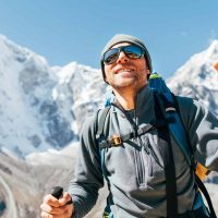 Man wearing sunglasses in the mountains