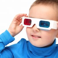 Boy wearing 3D glasses